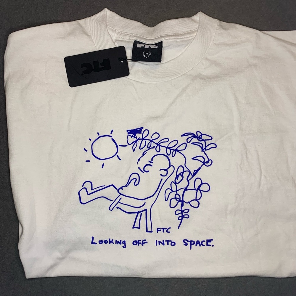 FTC Medium White Tshirt. 
“Looking off into Space”